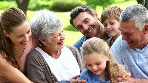 Grandparents, parents and children having a good time